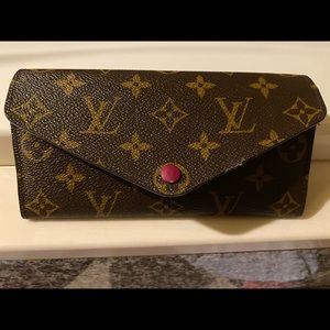 Louis Vuitton Emille style wallet.
